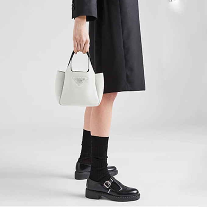 prada pebbled leather mini tote handbag with triangle metal logo